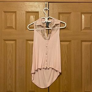 Sleeveless blouse with drop back